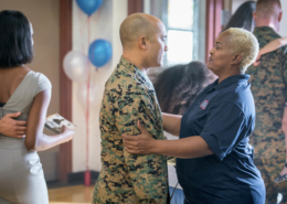 Military Veteran meeting with a member from the USO thank our heroes
